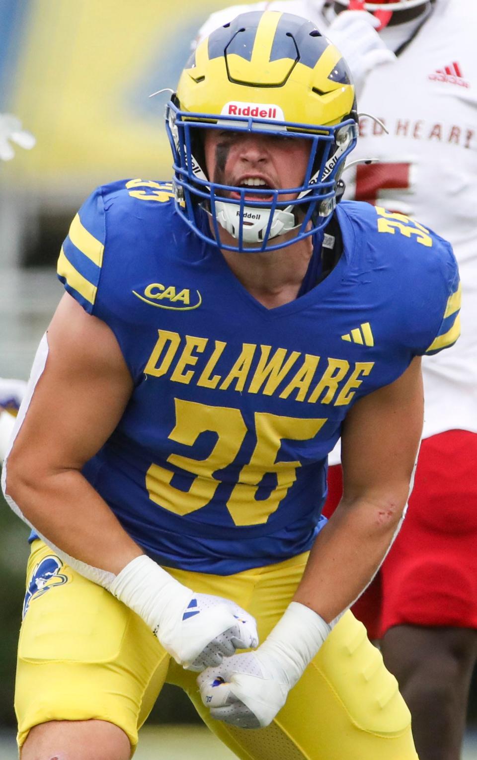 Delaware linebacker Gavin Moul reacts after a stop against Sacred Heart in the first half at Delaware Stadium, Saturday, Sept. 28, 2024.