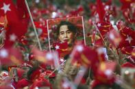 Power beckons for Aung San Suu Kyi's pro-democracy movement as it continues to grab parliamentary seats previously held by the ruling party in army-dominated Myanmar