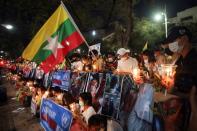 People attend prayer ceremony at U.N. building in Bangkok