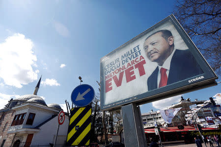 A billboard displaying a picture of Turkish President Tayyip Erdogan and a slogan reading: "Brave nation. Strong state. Millions of YES" is pictured ahead of the constitutional referendum in Istanbul, Turkey April 10, 2017. REUTERS/Murad Sezer