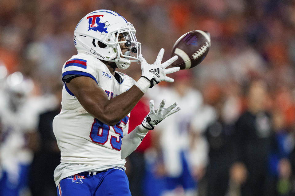 Louisiana Tech wide receiver Cyrus Allen makes a reception during the first half of the team's NCAA college football game against Clemson on Saturday, Sept. 17, 2022, in Clemson, S.C. (AP Photo/Jacob Kupferman)