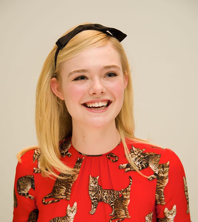 Elle Fanning just beautifully styled a plain white tee with these stunning pants