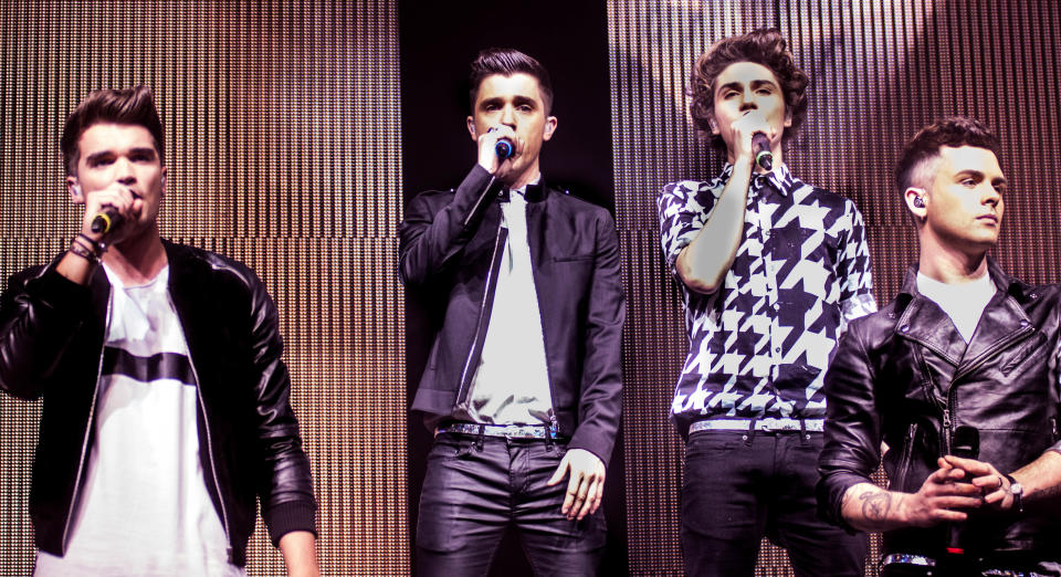 CARDIFF, UNITED KINGDOM - DECEMBER 15: Josh Cuthbert, JJ Hamblett, George Shelley and Jaymi Hensley of Union J performs on stage at Motorpoint Arena on December 15, 2013 in Cardiff, United Kingdom. (Photo by Mike Lewis Photography/Redferns via Getty Images)