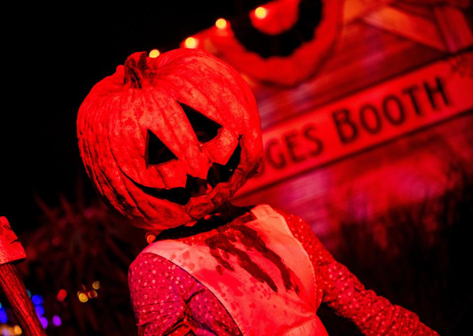 The Pumpkin Lord roams the streets as part of the  “Horrors of Halloween” scare zone at Universal Orlando Resort's Halloween Horror Nights.