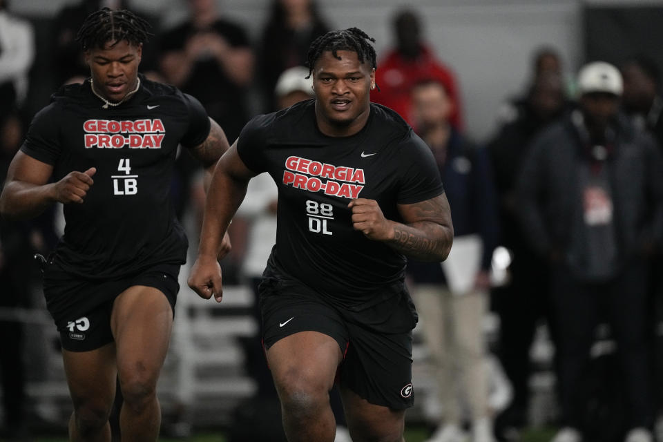 Georgia defensive lineman Jalen Carter runs football drills during Georgia's Pro Day, Wednesday, March 15, 2023, in Athens, Ga. (AP Photo/John Bazemore)