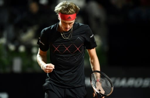 Defending champion Alexander Zverev eased into the third round in the Italian capital