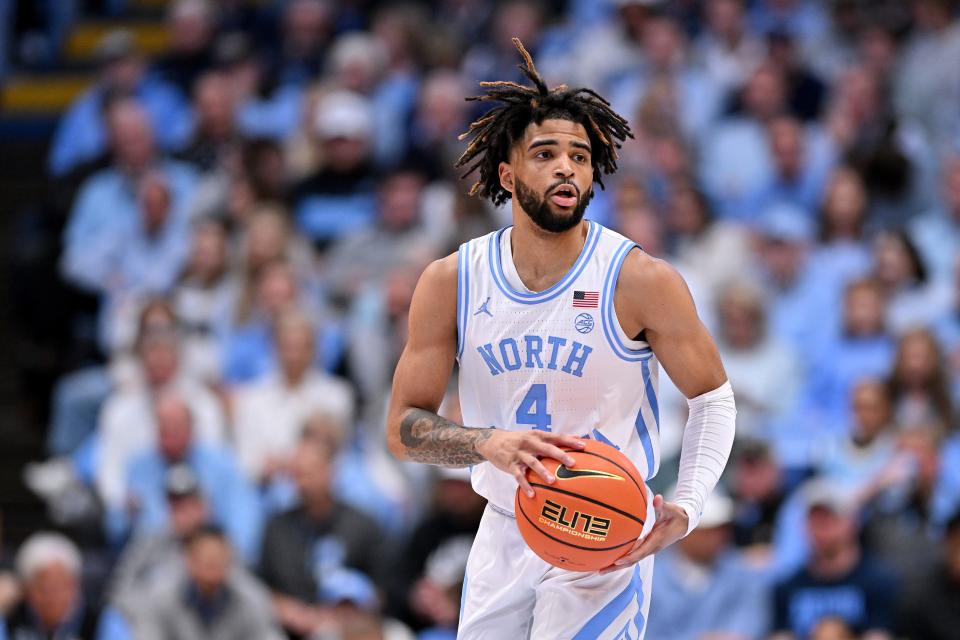 CHAPEL HILL, NORTH CAROLINA - JANUARY 13: RJ Davis #4 of the North Carolina Tar Heels moves the ball against the Syracuse Orangeduring the game at the Dean E. Smith Center on January 13, 2024 in Chapel Hill, North Carolina. The Tar Heels won 103-67. (Photo by Grant Halverson/Getty Images)