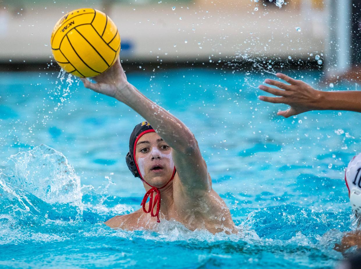 Palm Desert's Jordan Baker (3) passes the ball down the pool during the first quarter of their Division 2 CIF-SS playoff game at Palm Desert High School in Palm Desert, Calif., Tuesday, Nov. 1, 2022. 