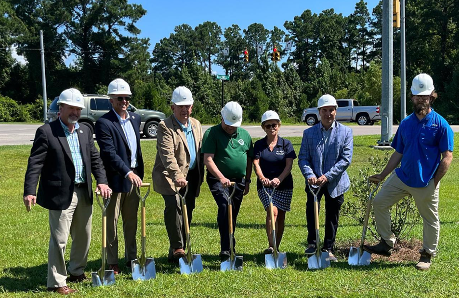 Town and state officials celebrate the beginning of construction on a project to widen N.C. 133 in Belville.