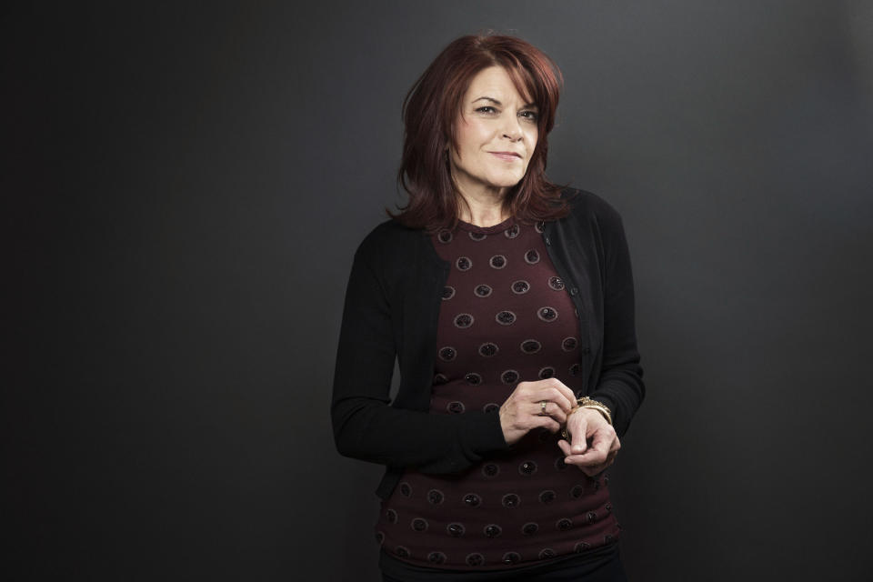 This Dec. 17, 2013 photo shows American singer-songwriter Rosanne Cash during a portrait session to promote her new album, "The River & The Thread" in New York. (Photo by Victoria Will/Invision/AP)