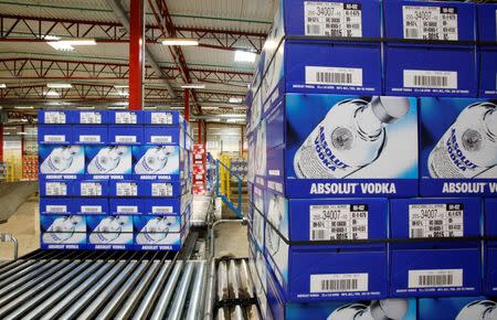 Cases of vodka are readied for transport at the Absolut shipping facility in Ahus in this photo taken July 17, 2007. REUTERS/Bob Strong