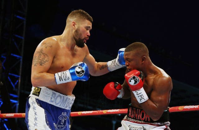 Tony Bellew, left, lands a left hook on Ilunga Makabu