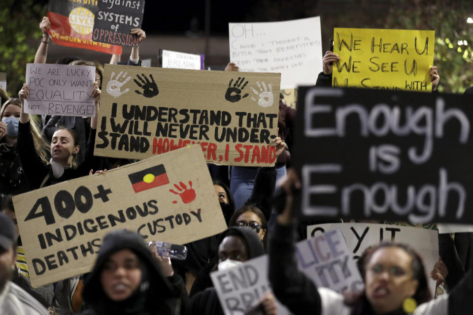 FILE - In this Tuesday, June 2, 2020 file photo protestors gather in Sydney to support the cause of U.S. protests over the death of George Floyd and urged their own government to address racism and police violence. (AP Photo/Rick Rycroft, File)