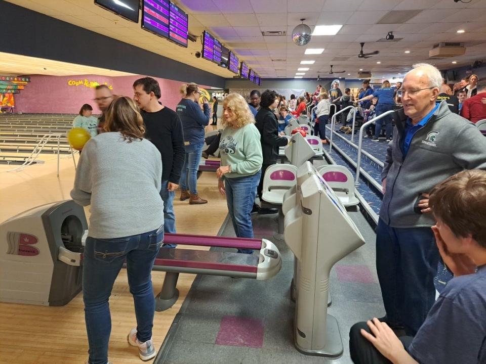 Kiwanis member volunteers Gloria Rafko and Doug Kuras are shown.