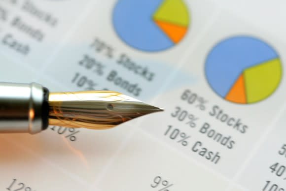 A fountain pen pointing to an asset allocation pie chart showing a majority of assets in stocks