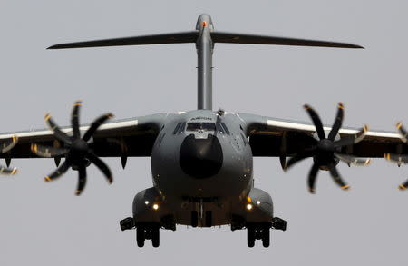 An Airbus A400M military plane flies, in this picture taken May 12, 2015, before it landed during a test flight at the airport of the Andalusian capital of Seville. REUTERS/Marcelo del Pozo/Files