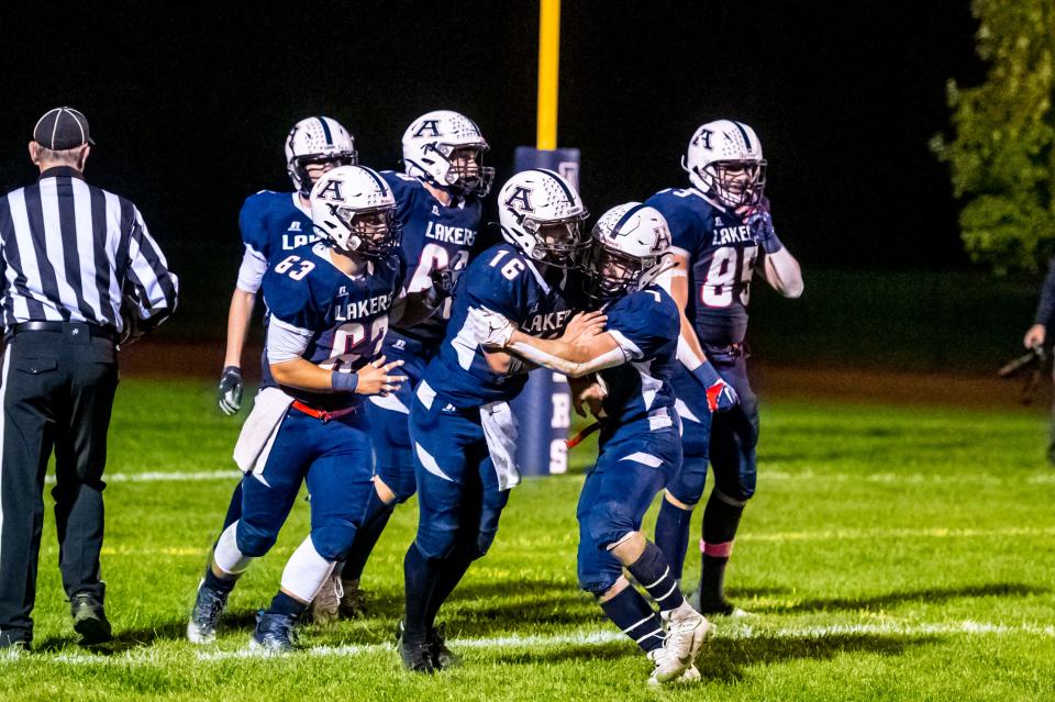 Apponequet celebrates the touchdown reception by Harrison Lemieux (16) from Jackson Gagnier.