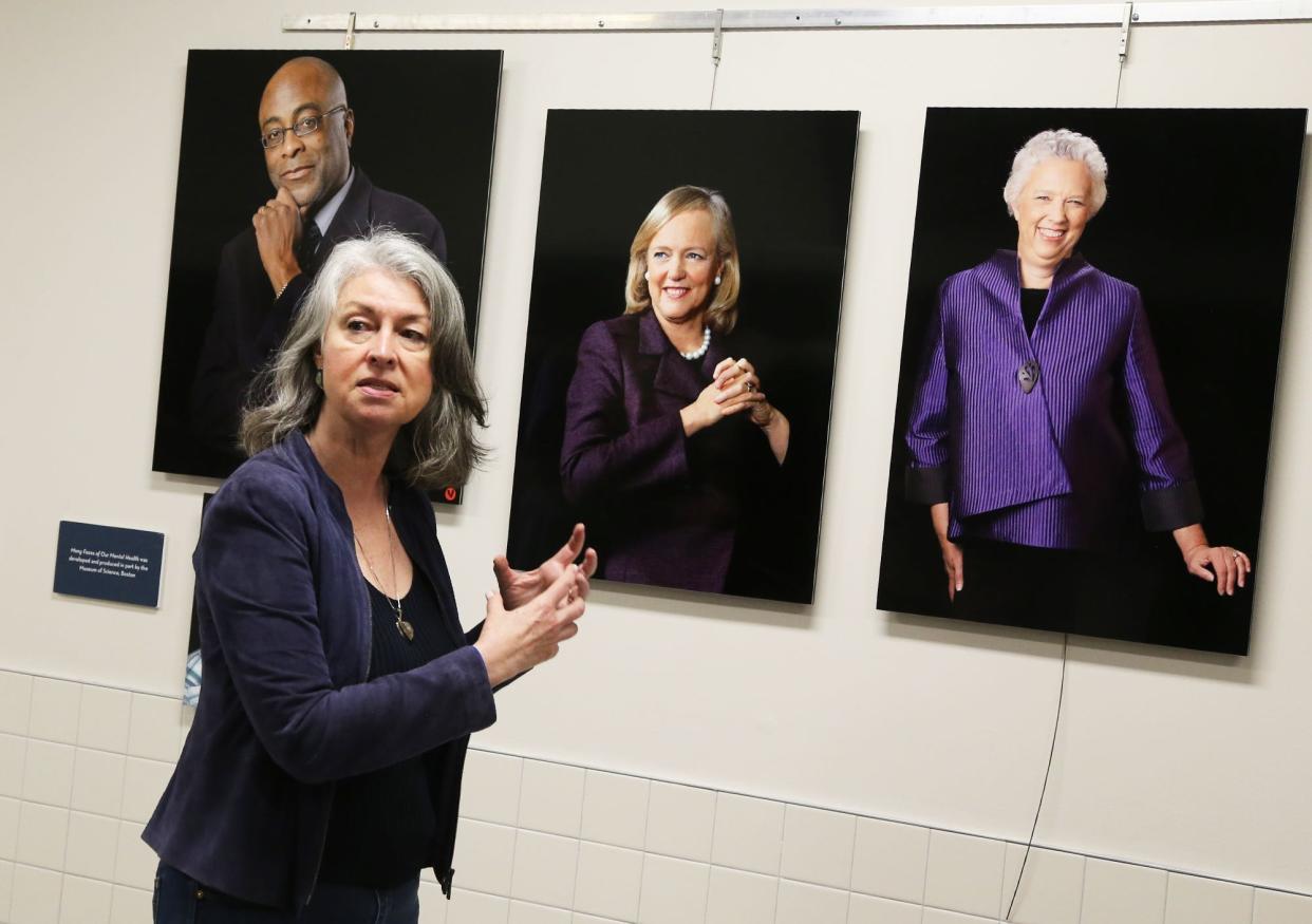 The 99 Faces Project, conceived of by artist Lynda Cutrell, working in collaboration with partners from science and journalism, addresses issues of stigma and mental illness. She explains the story behind images to a large group at Dover High School.