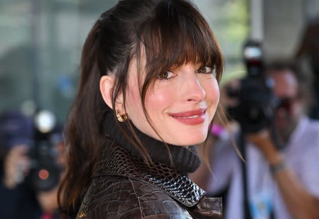 Anne Hathaway arrives to Michael Kors fashion show in New York City. (Photo: Photo by James Devaney/GC Images)