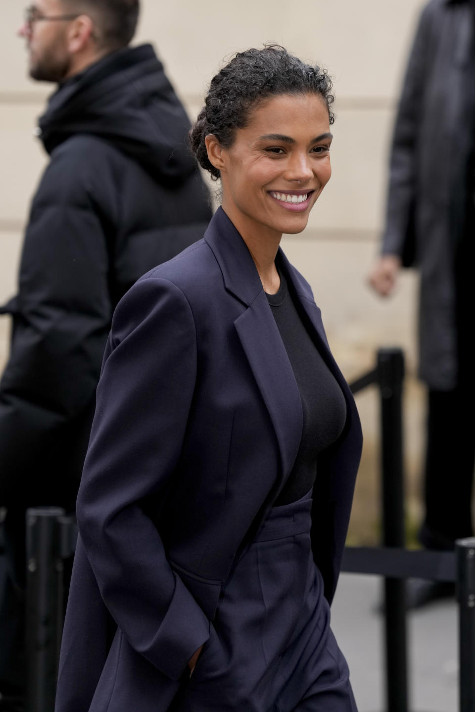 Tina Kunakey arrives for the Valentino Fall/Winter 2024-2025 ready-to-wear collection presented Sunday, March 3, 2024 in Paris. (Photo by Scott A Garfitt/Invision/AP)
