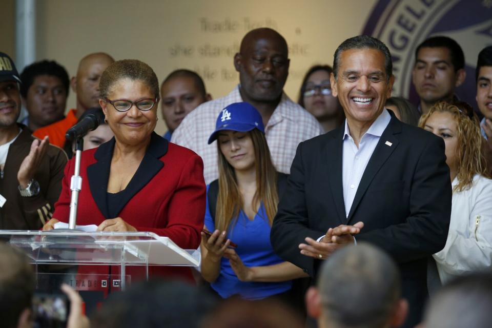 Former L.A. Mayor Antonio Villaraigosa, right, with Karen Bass.