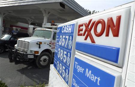 An Exxon gas station is pictured in Arlington, Virginia in this file photo taken January 31, 2012. REUTERS/Jason Reed/Files