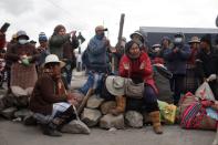 Anti-government protestors block a road demanding the resignation of Peru's President Dina Boluarte, in Condoroma