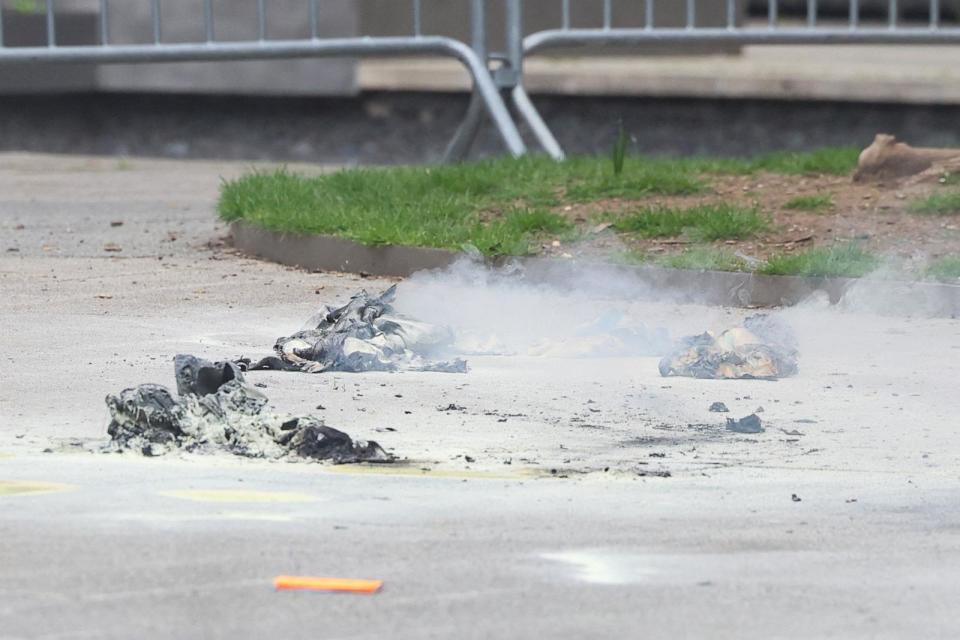 PHOTO: A view of the scene where a person was covered in flames outside the courthouse where former President Donald Trump's criminal hush money trial is underway, in New York, April 19, 2024.  (Brendan Mcdermid/Reuters)