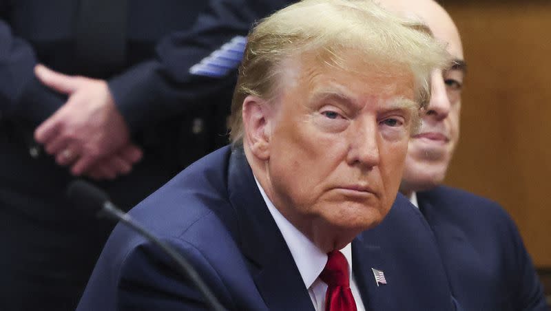 Former President Donald Trump appears during a court hearing at Manhattan criminal court on Thursday, Feb. 15, 2024, in New York. A New York judge says Trump’s hush-money trial will go ahead as scheduled with jury selection starting on March 25.