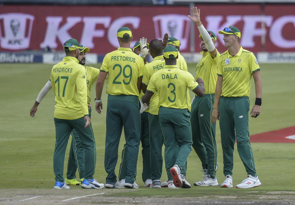 South Africa's Andile Phehlukwayo celebrating with his team mates after getting a wicket during the T20I match between South Africa and Sri Lanka at Wanderers Stadium in Johannesburg, South Africa, Sunday, March 24, 2019. (AP Photo/Christiaan Kotze)