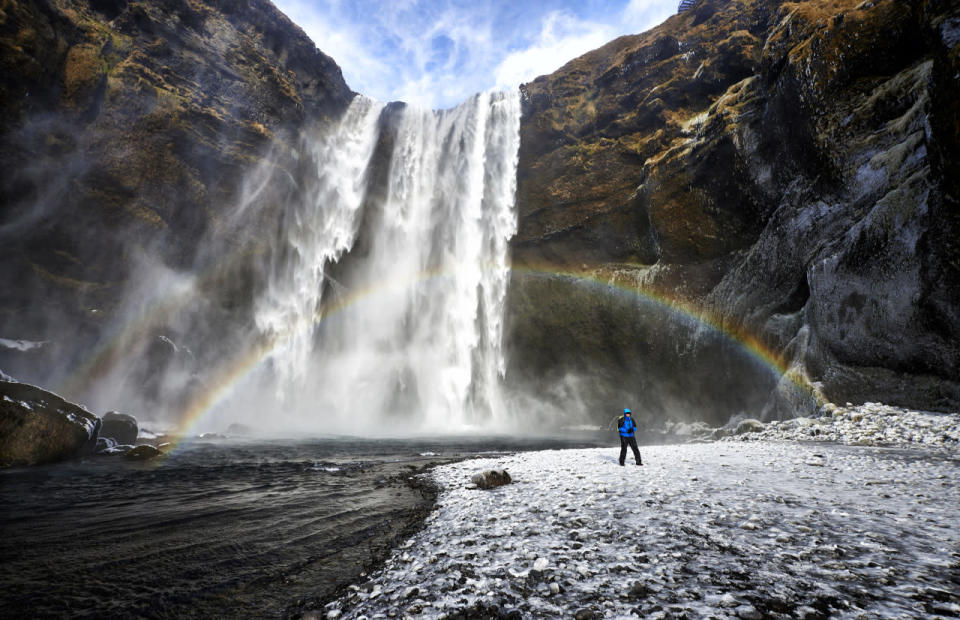 A rainbow appears in front of a waterfall in Iceland. (Michael Fersch/Caters News Agency)