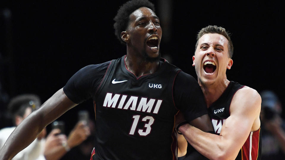 Bam Adebayo and Duncan Robinson celebrate after Adebayo's buzzer-beater to lift the Miami Heat over the Brooklyn Nets. (Photo by Carlos Goldman/NBAE via Getty Images)