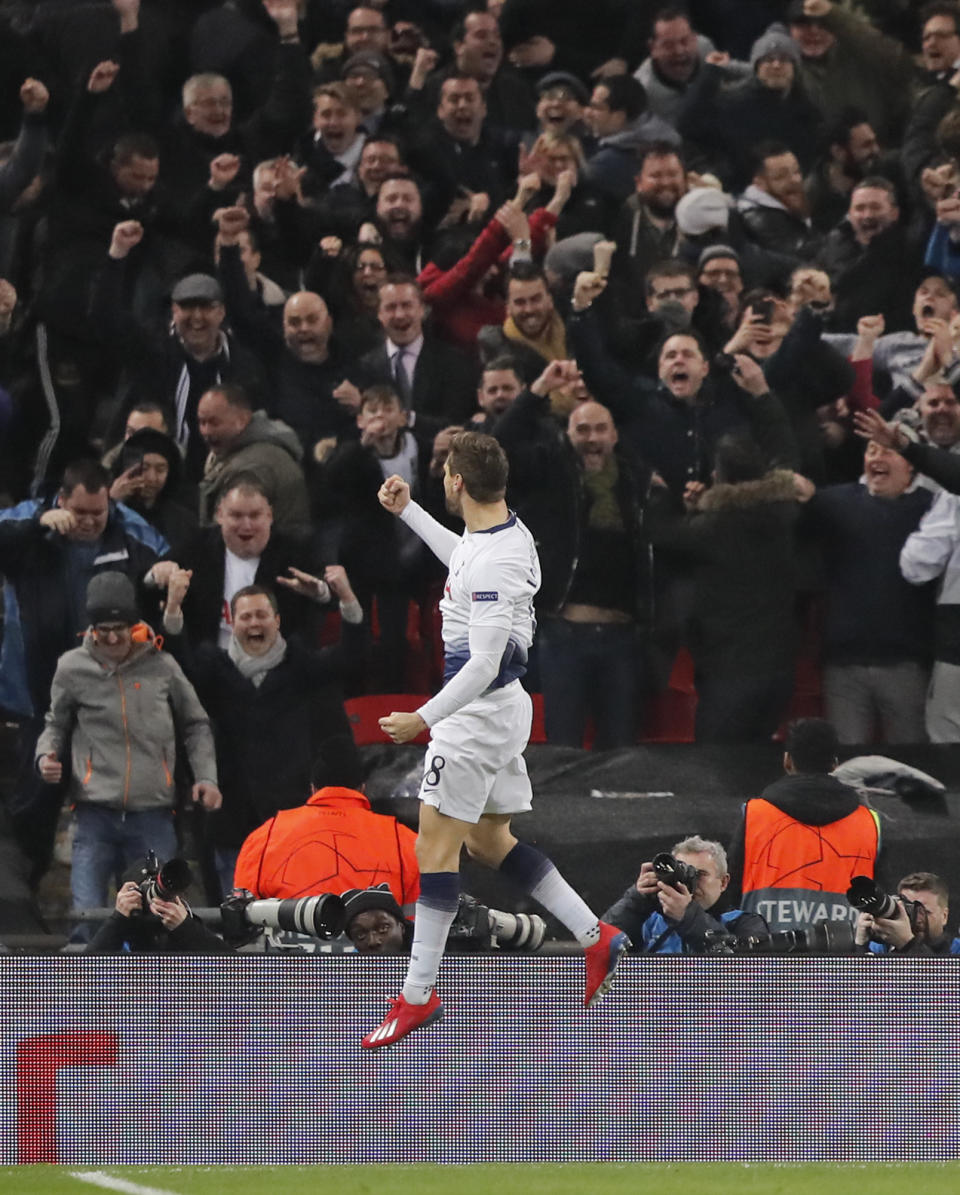 Tottenham forward Fernando Llorente celebrates with supporters after scoring his side's third goal during the Champions League round of 16, first leg, soccer match between Tottenham Hotspur and Borussia Dortmund at Wembley stadium in London, England, Wednesday, Feb. 13, 2019. (AP Photo/Frank Augstein)