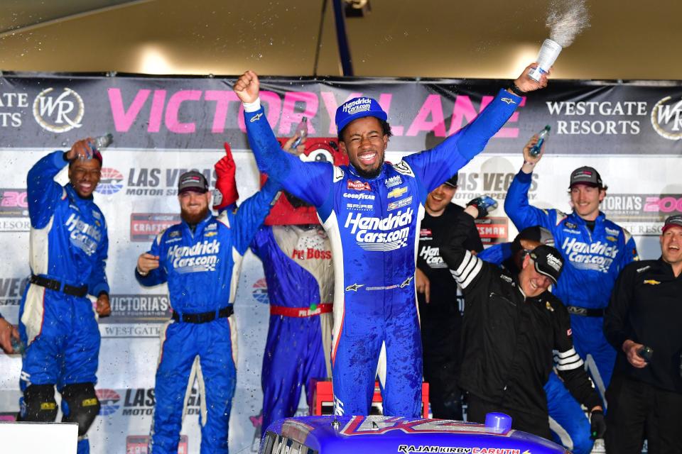 Mar 1, 2024; Las Vegas, Nevada, USA; NASCAR Truck Series driver Rajah Caruth (71) celebrates his victory of the Victorias Voice Foundation 200 at Las Vegas Motor Speedway. Mandatory Credit: Gary A. Vasquez-USA TODAY Sports