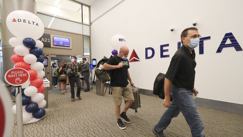 Passengers arrive from Billings, Montana, on the first flight to the new Salt Lake City International Airport in Salt Lake City on Tuesday, Sept. 15, 2020. 