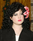 Kelly Osbourne created an unruly combination of curls and flowers at the 2002 awards. (Photo by Maury Phillips/WireImage)