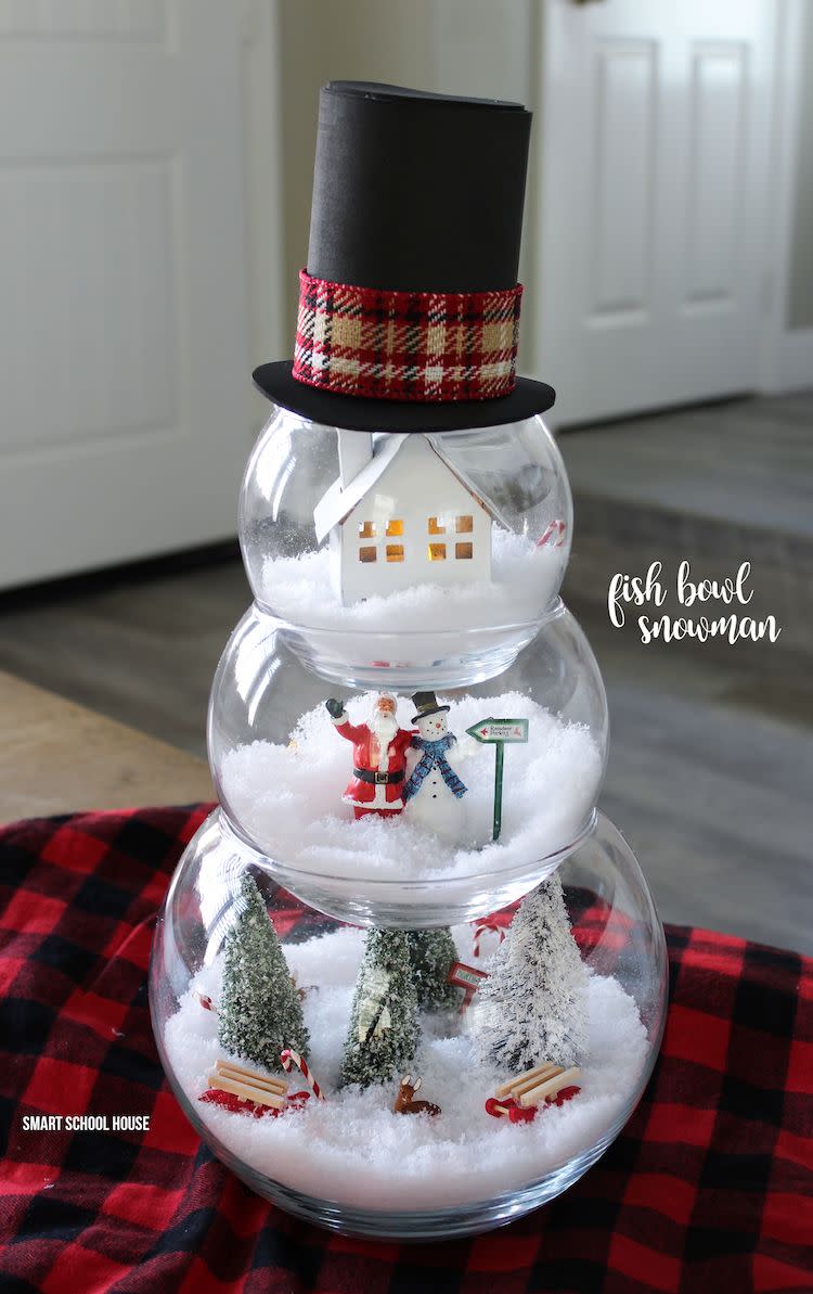 <p>We love this unique spin on a winter terrarium. Feel free to get creative with the different scenes you choose.</p><p><strong>Get the tutorial at <a href="https://www.smartschoolhouse.com/diy-crafts/fish-bowl-snowman" rel="nofollow noopener" target="_blank" data-ylk="slk:Smart School House;elm:context_link;itc:0;sec:content-canvas" class="link ">Smart School House</a>.</strong></p><p><strong><a class="link " href="https://www.amazon.com/Ounces-Clear-Bowls-Heavy-Plastic/dp/B07C5W96K8/?tag=syn-yahoo-20&ascsubtag=%5Bartid%7C10050.g.22825300%5Bsrc%7Cyahoo-us" rel="nofollow noopener" target="_blank" data-ylk="slk:SHOP FISH BOWLS;elm:context_link;itc:0;sec:content-canvas">SHOP FISH BOWLS</a><br></strong></p>