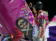 Shaun White of the U.S. reacts after he crashed during the men's snowboard halfpipe final event at the 2014 Sochi Winter Olympic Games, in Rosa Khutor February 11, 2014. REUTERS/Mike Blake (RUSSIA - Tags: SPORT OLYMPICS SPORT SNOWBOARDING)