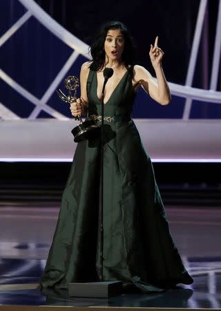 Sarah Silverman accepts the award for Outstanding Writing For A Variety Series for HBO's "Sarah Silverman: We Are Miracles" during the 66th Primetime Emmy Awards in Los Angeles, California August 25, 2014. REUTERS/Mario Anzuoni