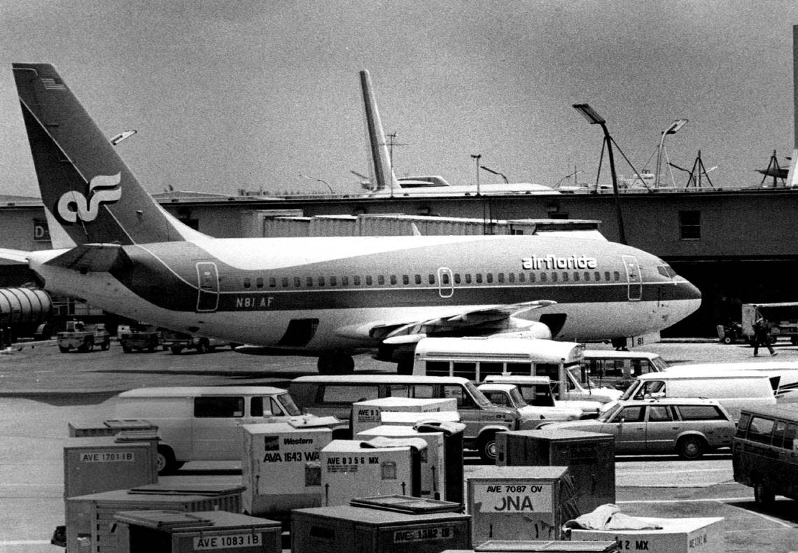 One of the last Air Florida planes at its gate on concourse D sits waiting for a tow truck to take it back to the maintenance hangars after announcement of bankruptcy in 1984.