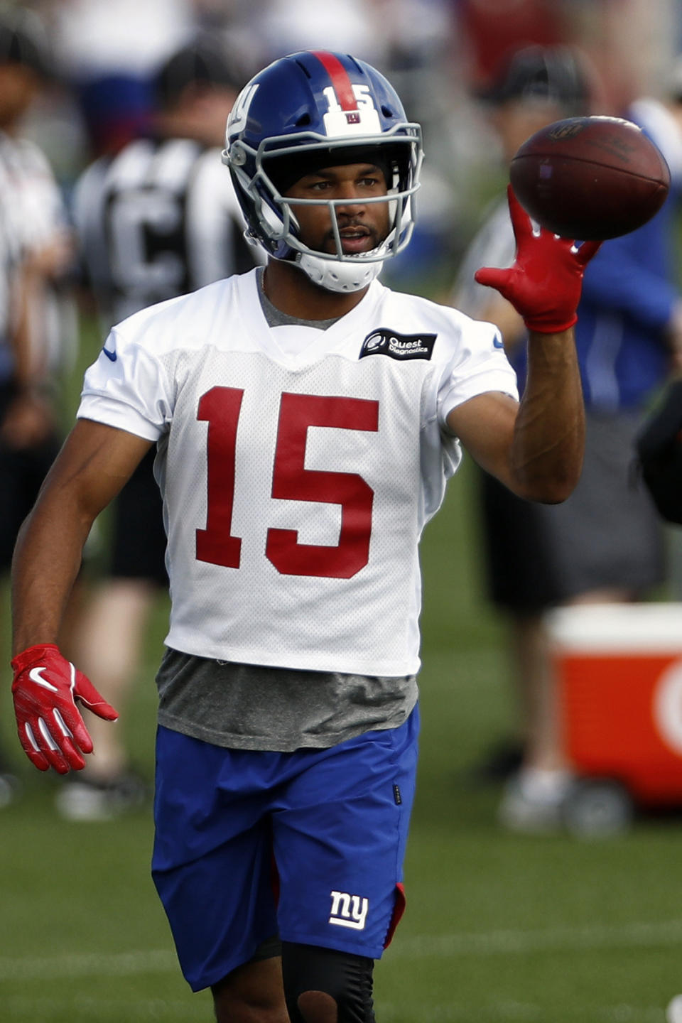FILE - In this May 20, 2019, file photo, New York Giants wide receiver Golden Tate makes a catch during an NFL football practice in East Rutherford, N.J. Golden Tate has had the appeal of his four-game suspension for a violation of the NFL's policy on performance enhancers turned down. The decision by an independent arbiter was announced Tuesday, Aug. 13, 2019, and means the 10-year-veteran will miss the first four games of the regular season, starting with Dallas on Sept. 8. (AP Photo/Adam Hunger, File)