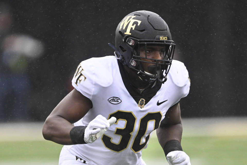 FILE - Wake Forest defensive lineman Jasheen Davis (30) plays against Vanderbilt during an NCAA college football game, Sept. 10, 2022, in Nashville. Wake Forest opens the season against Elon on Aug. 31, 2023. (AP Photo/John Amis, File)