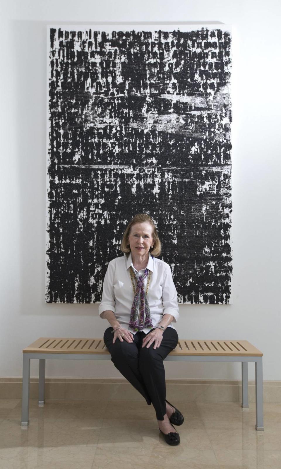 Rosa de la Cruz sitting in front of Glenn Ligon’s “Masquerade #4” in her art filled home on Key Biscayne on Wednesday, September 21, 2016. The renowned art collector and arts patron died in Miami at age 81 on Feb. 25, 2024.