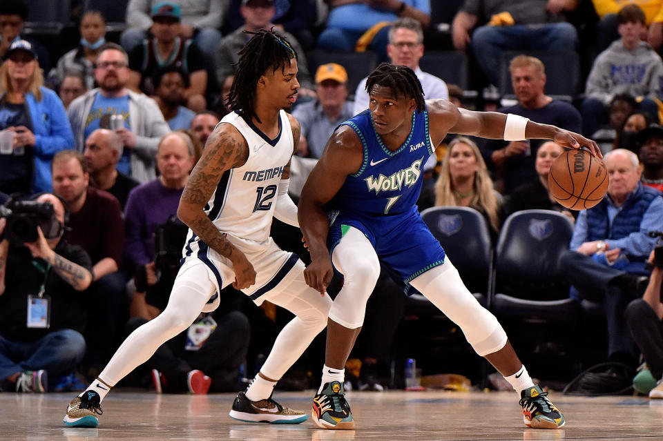 Minnesota Timberwolves' Anthony Edwards handles the ball against Memphis Grizzlies' Ja Morant during Game 1 of their NBA playoffs first-round series on April 16, 2022. (Justin Ford/Getty Images)