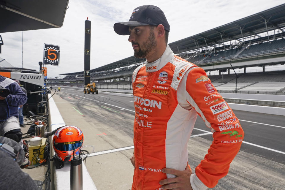 Rinus VeeKay, of the Netherlands, talks with his crew following practice for the Indianapolis 500 auto race at Indianapolis Motor Speedway, Sunday, May 22, 2022, in Indianapolis. (AP Photo/Darron Cummings)