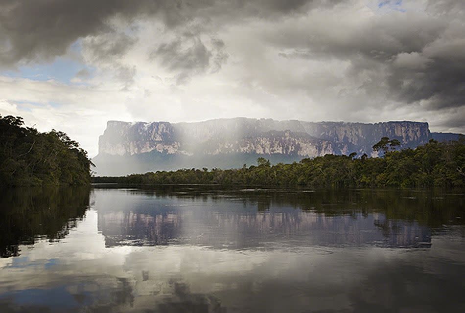 Auyantepui, Canaima National Park, Venezuela. <br><br>Auyantepui is an enormous flat-topped mountain, with an area of over 270 sq miles, that is home to Angel Falls, the highest vertical drop waterfall in the world. <br><br>Camera: Canon 5D MkII <br><br>Philip Lee Harvey, UK <br><br>Commended, Natural Elements portfolio