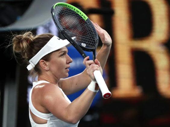 Simona Halep celebrates victory (AP)