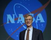 FILE - In this Oct. 3, 2006 file photo, Nobel Prize for Physics winner John Mather speaks at a news conference at NASA headquarters in Washington. Mather, the senior project scientist for NASA's James Webb Space Telescope, which is planned for launch into space in 2021, said the space-based instrument will be extremely effective at gathering infrared light and will help compensate for the advantage that Hawaii's Mauna Kea has over the backup site on La Palma, Spain. (AP Photo/Kevin Wolf, File)