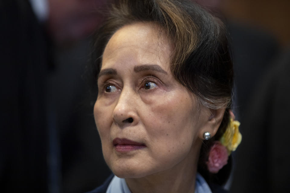 FILE - Myanmar's leader Aung San Suu Kyi waits to address judges of the International Court of Justice in The Hague, Netherlands, Dec. 11, 2019. A Myanmar court convicted Suu Kyi in more corruption cases Monday, Aug. 15, 2022, adding six years to prison sentence. (AP Photo/Peter Dejong, File)