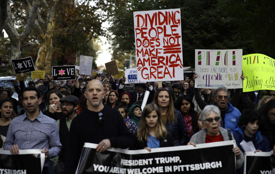 Protesters gathered as President Donald Trump and first lady Melania Trump visited the memorials of the Tree of Life shooting victims. (Photo: ASSOCIATED PRESS)